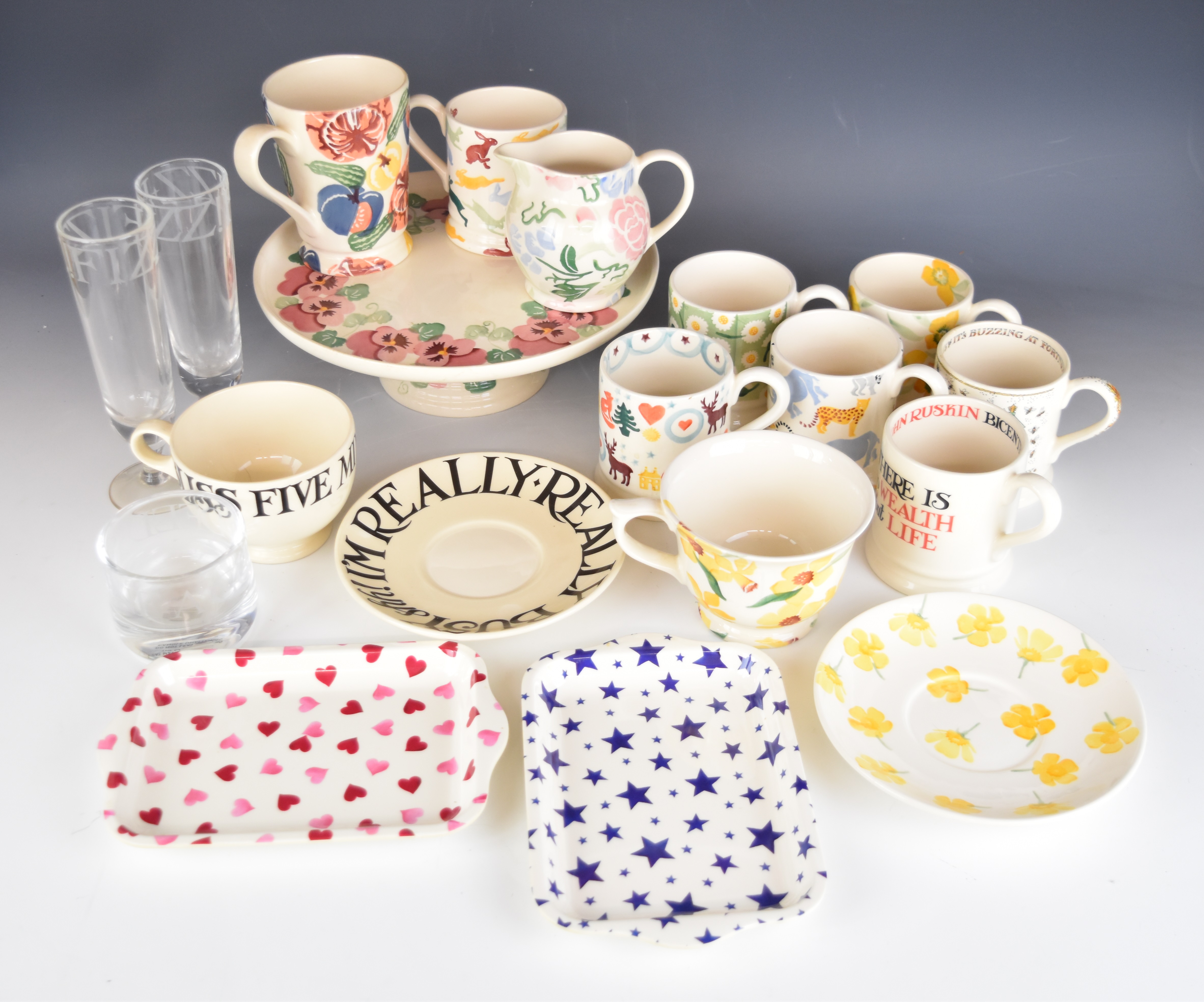 Emma Bridgewater ceramics including a tazza with pansy decoration, mugs, cups and saucers, glasses