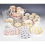 Emma Bridgewater ceramics including a tazza with pansy decoration, mugs, cups and saucers, glasses