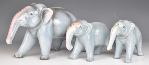 Three Indian Gwalior pottery elephant figures, tallest 19cm