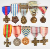 Ten French WW2 era medals including Volunteers Medal, North Africa Service Medal, Combatants Cross