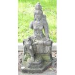 Lava stone sculpture of a seated deity, from the Borobadur temple area, Java, Indonesia, height