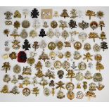 Large collection of approximately 100 British Army cap badges including Lancashire Fusiliers,