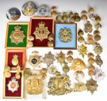 Collection of approximately 40 British Army badges for Glengarry, bearskin and other headwear