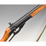 Daisy Model 99 Winchester style underlever-action air rifle with wooden grip and forend, canvas