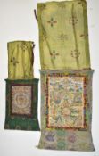 Two Indian watercolour scroll paintings laid on embroidered fabric, largest 105 x 65cm