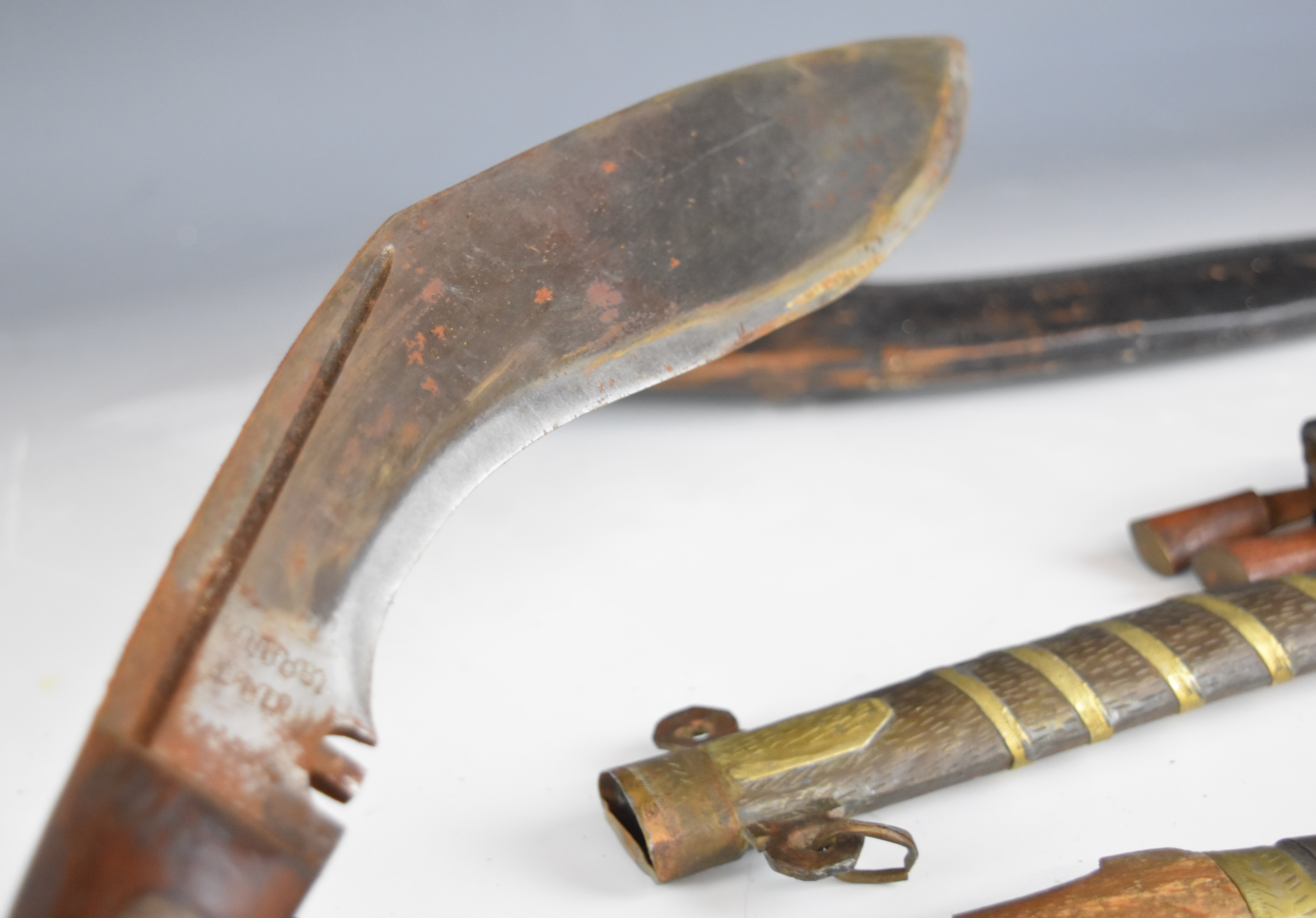 Two kukri knives both with wooden handles, longest blade 30cm, together with two Jambiya knives of - Image 7 of 7