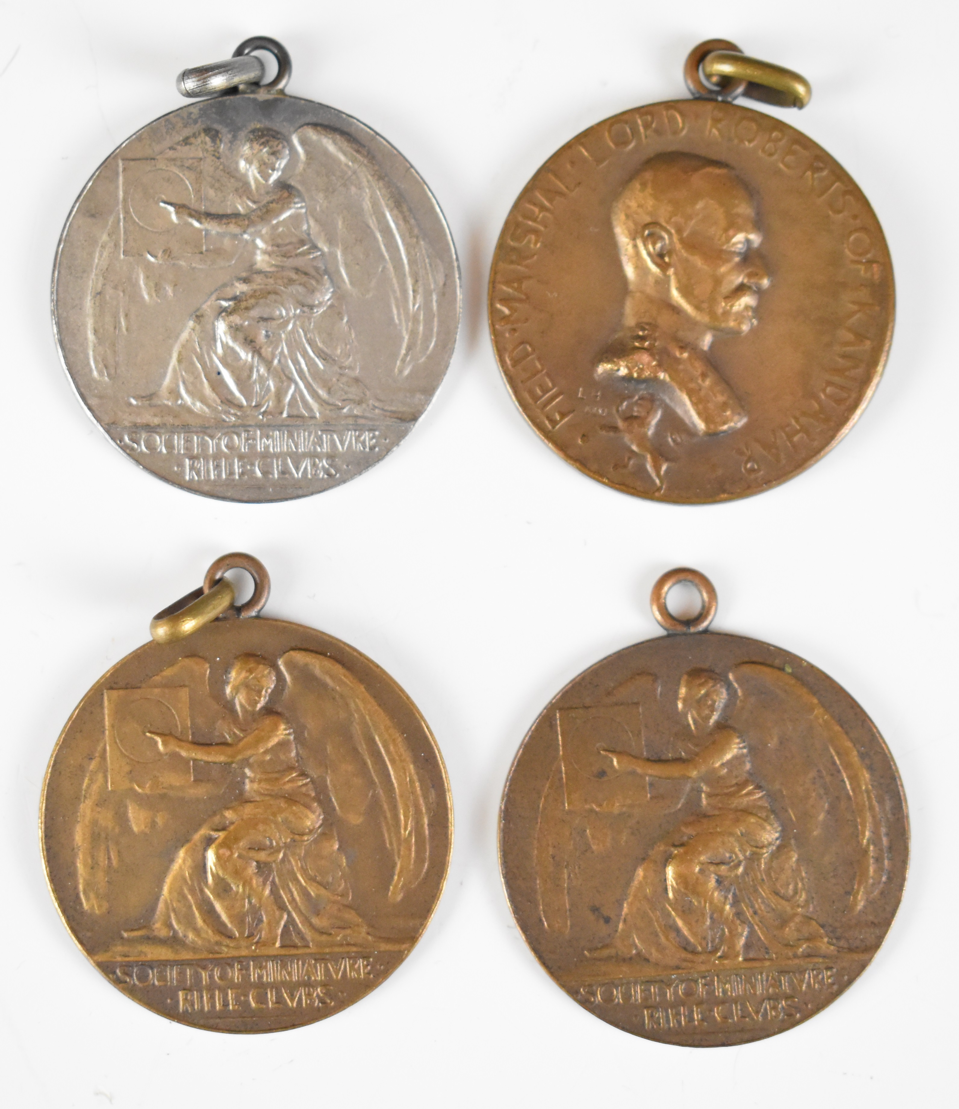 Eight Society of Miniature Rifle Clubs medals comprising two hallmarked silver examples (one - Image 4 of 8
