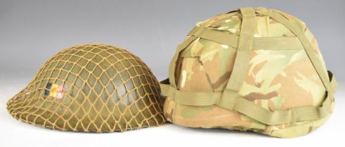 Two helmets, one Brodie style example with scrim netting, liner and chin strap the other a helmet