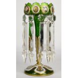 Victorian overlaid glass lustre vase with floral and gilt decoration over a green ground and clear