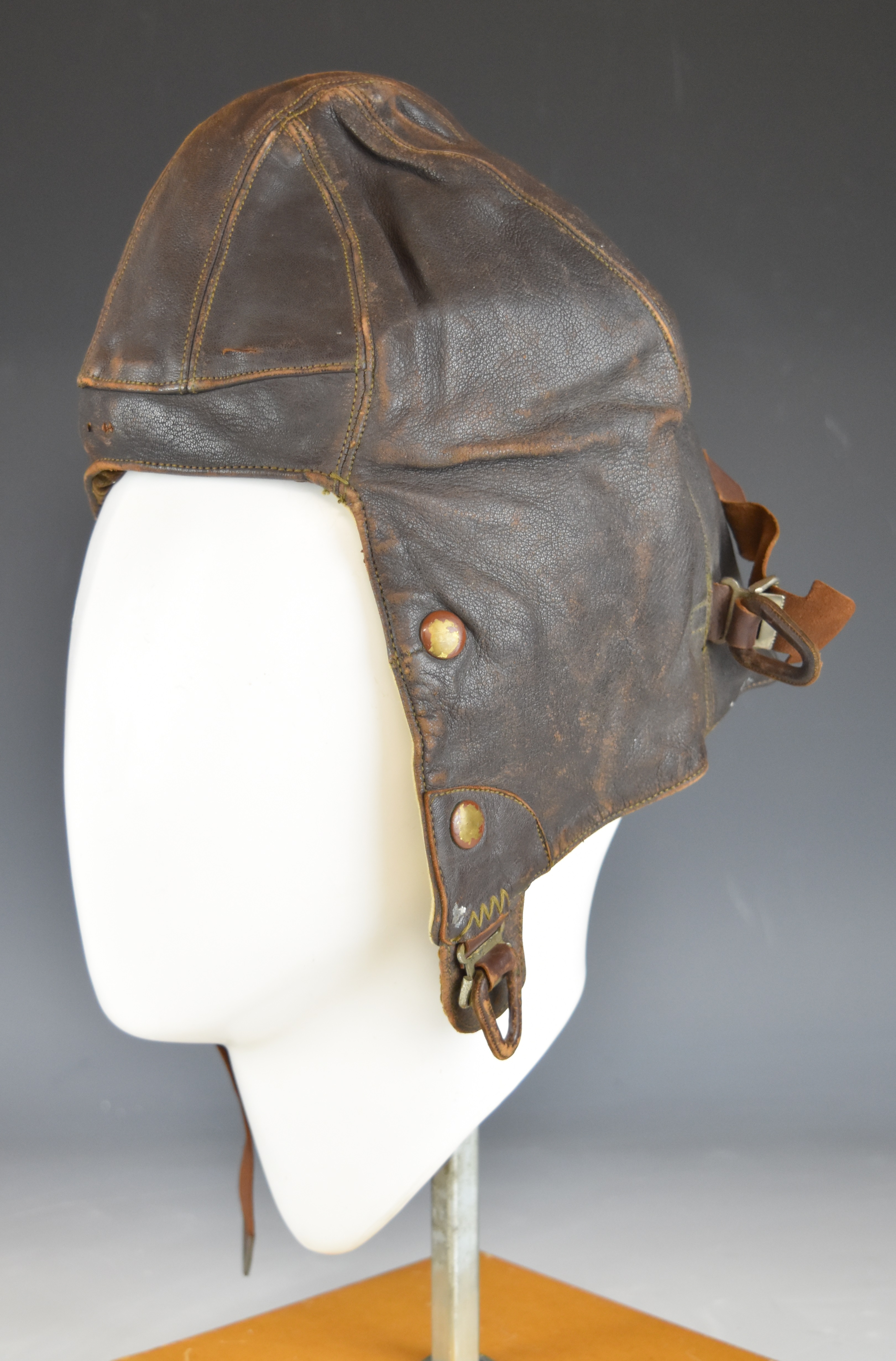 British WW2 leather flying helmet stamped AM 226/65 with label Wareings, Northampton, No 1, size