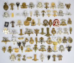 Collection of approximately 70 British Cavalry Regiment badges including 11th Hussars, Light