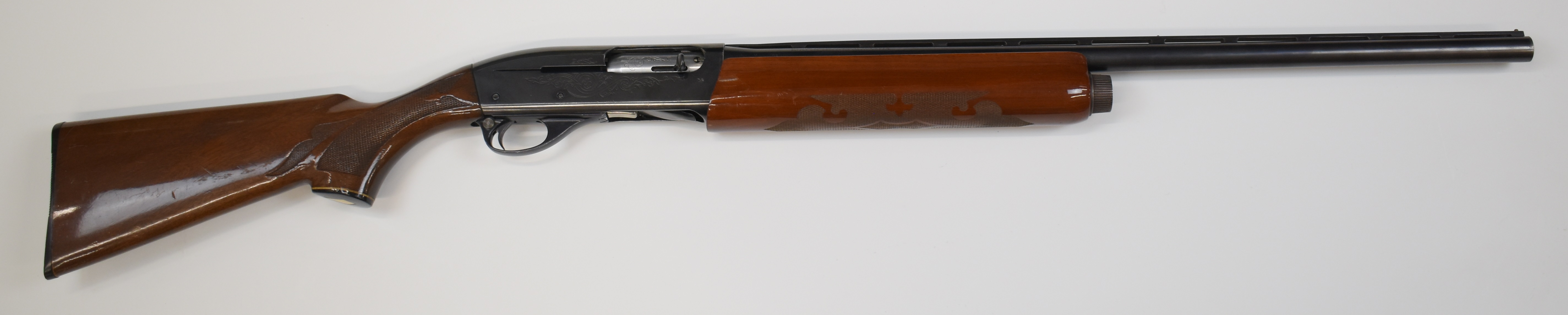 Remington Model 1100 12 bore 3-shot semi-automatic shotgun with ornately carved and chequered semi- - Image 2 of 10