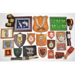 Militaria plaques, stable and leather belts, including 49th Infantry Division, 15th Lancashire R V