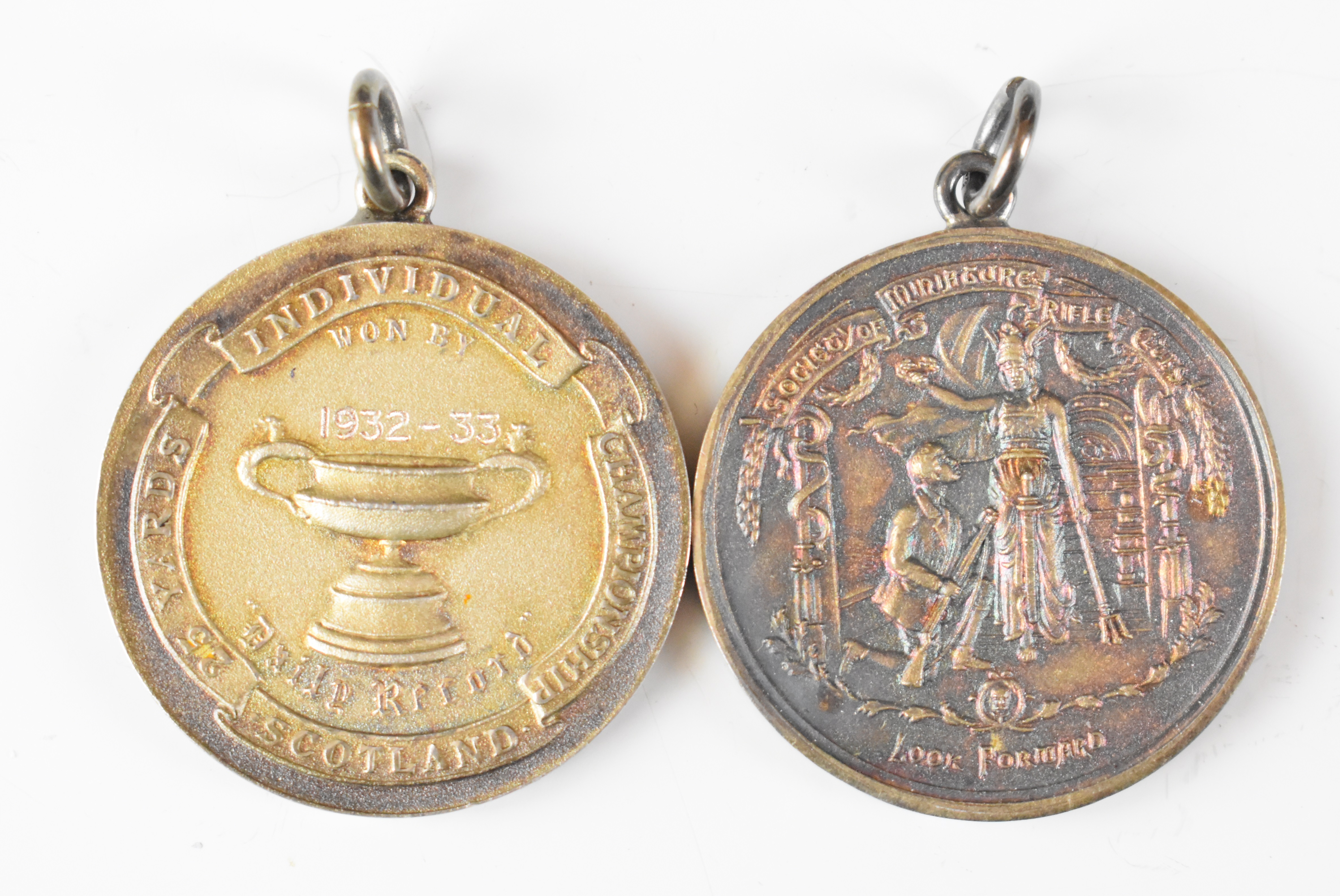 Eight Society of Miniature Rifle Clubs medals comprising two hallmarked silver examples (one - Image 8 of 8
