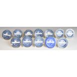 Twelve 19thC blue and white transfer printed circular place name plaques in the form of miniature