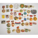 Approximately forty Russia badges including some CCCP examples