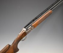 Beretta DT11 ACS 12 bore over and under ejector shotgun with named locks and underside, chequered
