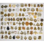 Large collection of approximately 100 British Army cap badges including Manchester 5th Volunteer