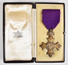 The Most Excellent Order of the British Empire Officer's award, OBE Civil Division, in Garrard