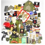 Large collection of approximately 100 military insignia including Army, Royal Navy and Royal Air