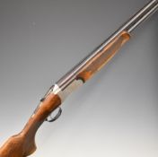 Marocchi 12 bore over under ejector shotgun with engraved locks, underside, top plate and fences,
