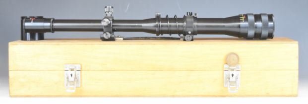 Tasco 708 20x40 target rifle scope with roll-on roll-off mounts, in fitted wooden box.