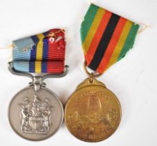 Rhodesian General Service Medal, named to PR76110 Bdr J V M McCormack and a Zimbabwe Independence
