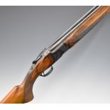 Miroku 12 bore over and under ejector shotgun with engraved locks, trigger guard, thumb lever and