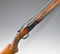 Miroku 12 bore over and under ejector shotgun with engraved locks, trigger guard, thumb lever and