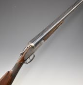Armstrong & Co of Newcastle on Tyne 12 bore sidelock side by side shotgun with all over scrolling