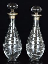 Pair of Elizabeth II hallmarked silver mounted cut glass decanters, Birmingham 2013, maker W I