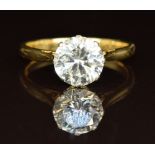 An 18ct gold ring set with a round cut diamond of approximately 2.2ct, with an insurance valuation