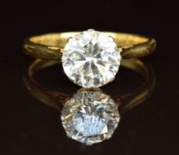 An 18ct gold ring set with a round cut diamond of approximately 2.2ct, with an insurance valuation