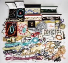 A collection of jewellery including Jacobite brooch, Avon jewellery, pearl and hardstone necklace,