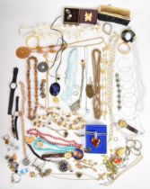 A collection of jewellery, some silver including charm bracelet, bracelet with pressed amber