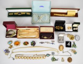 A collection of costume jewellery including Sphinx, Sarah Coventry, Miracle pendant, three silver