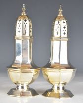 Pair of Victorian hallmarked silver sugar casters of octagonal baluster form, Sheffield 1899,