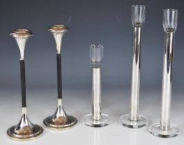 Five modern hallmarked silver mounted candlesticks comprising a set of three silver mounted glass