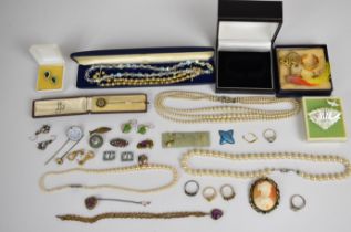 A collection of jewellery including silver earrings, cameo brooch, Japanese stick pin, silver