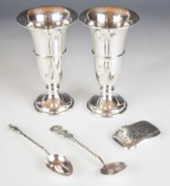 Pair of Elizabeth II hallmarked silver vases with weighted bases, Birmingham 1958, maker Bracelon