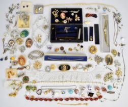 A collection of jewellery including silver bracelet, vintage and silver earrings, brooches including