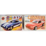 Two Airfix 1:25 scale plastic model sports car kits comprising Ford EXP 06432 and Cavalier J-Car