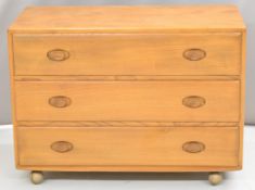 Ercol light elm mid century modern chest of three drawers, W91 x D43 x H65.5cm