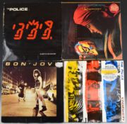 Approximately twenty LPs including Police, Bon Jovi, ELO, Crowded House, Tom Waits, Foreigner,