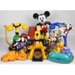 Six novelty character telephones comprising Mickey Mouse, Pluto, Disney Dixieland Band, M&Ms,