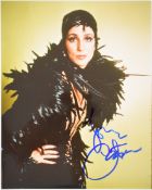 Cher signed photo with signature in blue marker pen to lower right. Complete with certificate of