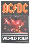 AC/DC signed World Tour Programme (1980) bearing the signatures of band members Angus Young, Malcolm