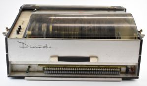 Discomatic portable jukebox with the capacity to hold forty 45rpm vinyl records. Jukeboxes of this