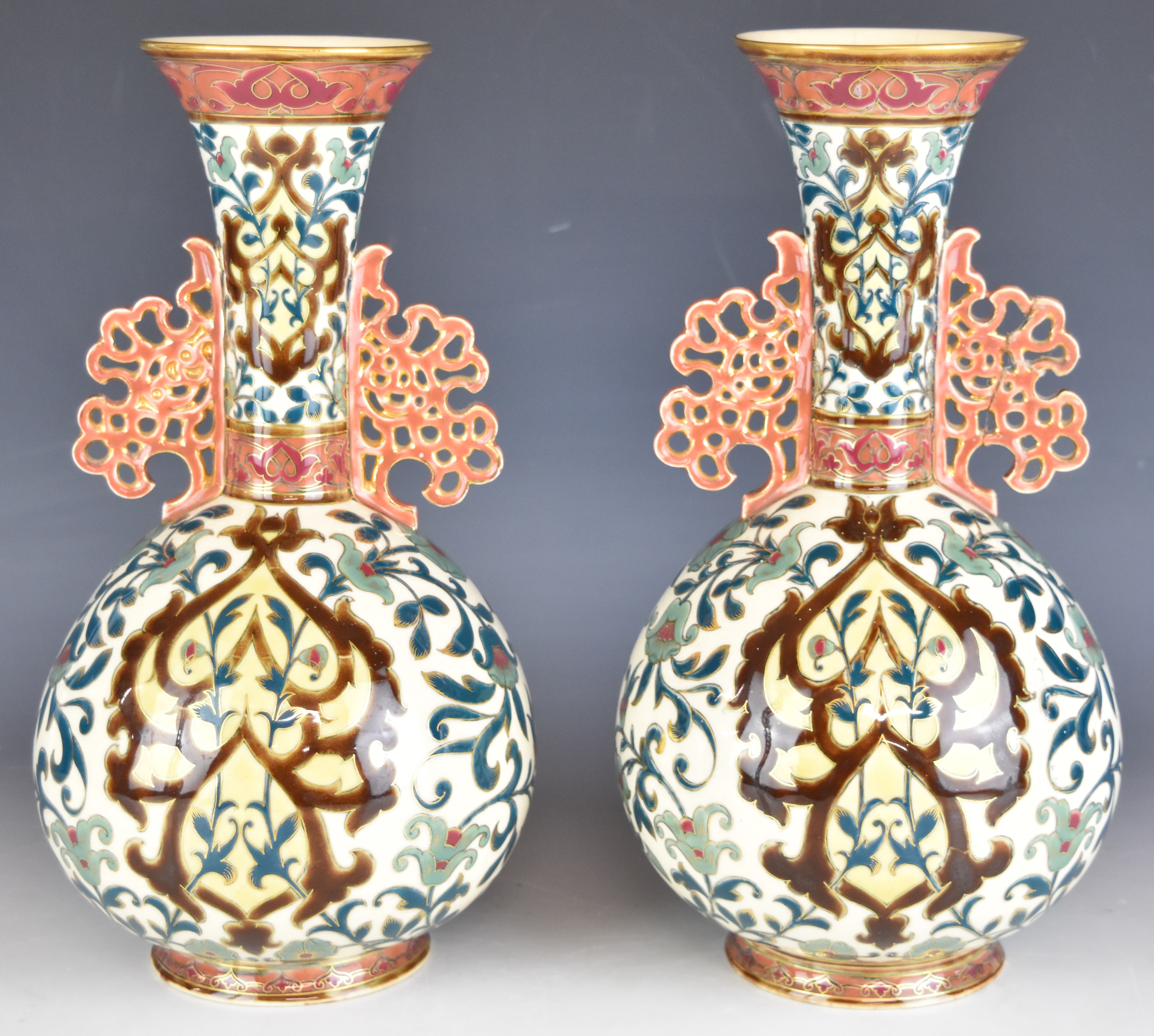 Zsolnay Pecs pair of pedestal vases with reticulated twin handles, H32cm