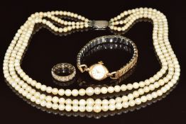 A 9ct gold watch three strand cultured pearl necklace with silver clasp and 9ct gold eternity ring